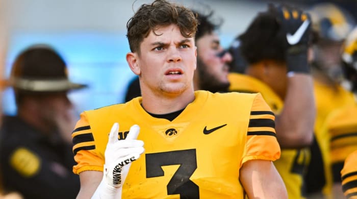 Iowa's Cooper DeJean reacts on the sideline.